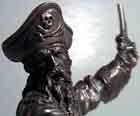 Barbe-Noire, statuette en laiton